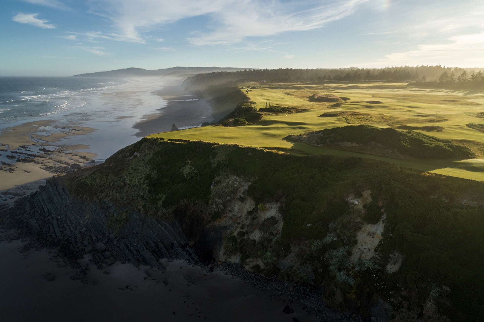 Aerial view of Sheep Ranch holes running along the cliff edge above the beach
